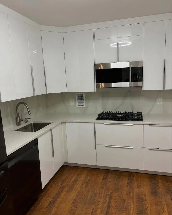 Restored kitchen with white cabinets after water damage in Harlingen